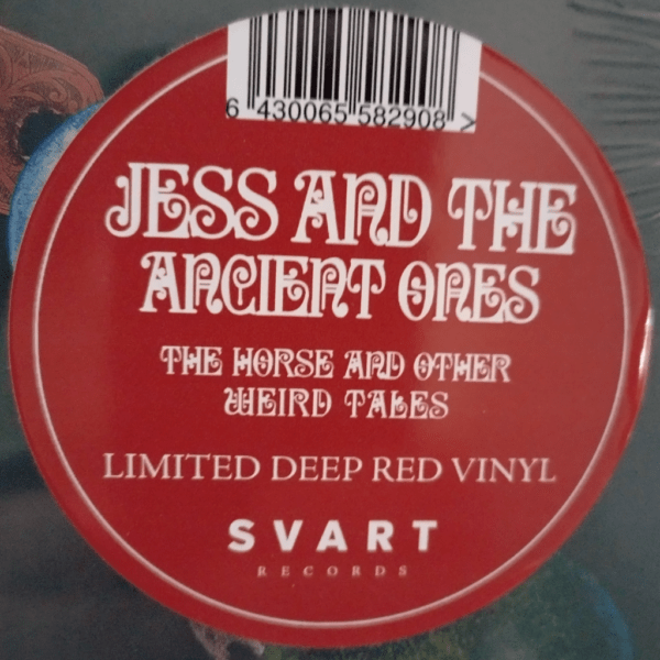 Sticker on album The Horse and Other Weird Tales cover of red vinyl explaining about the album. Barcode above.
