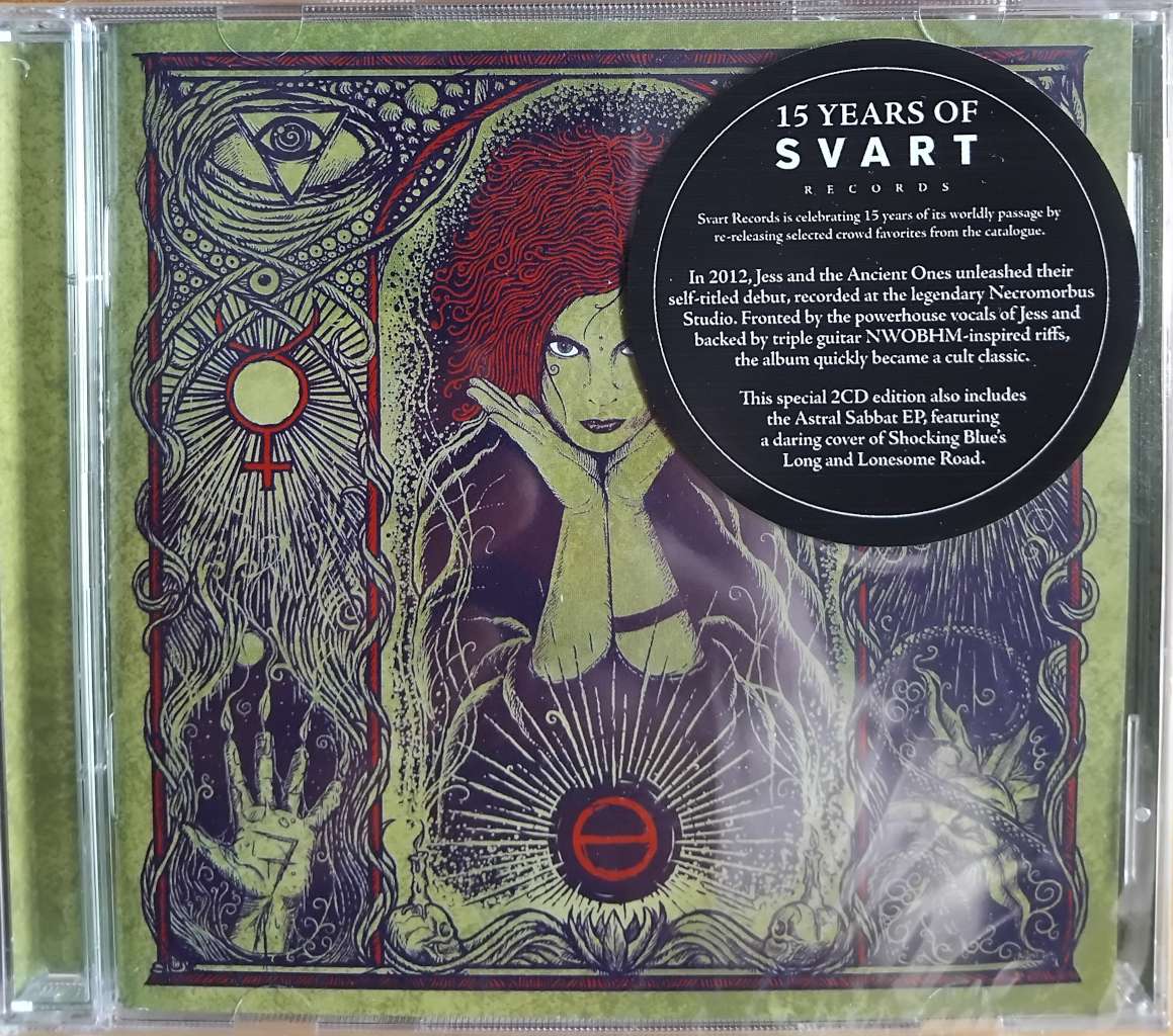 Various occult symbols on the pages. A woman's head in the middle, curly hair and palms on the sides of her face. The main color of the picture is green. Black CD sticker with the text on the up right corner.